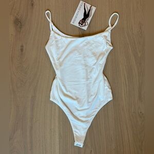 NWT naked wardrobe Small white tank bodysuit